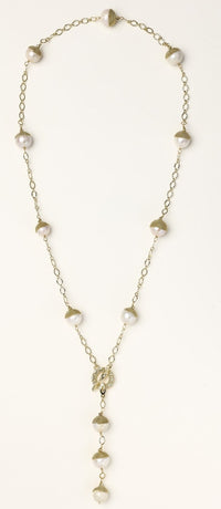 Long gold-plated lariat necklace featuring baroque pearls with metal caps arranged in elegant Y-shape design