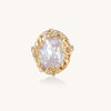 Ornate gold-plated ring with large baroque pearl in decorative vine-like setting with small crystal accents