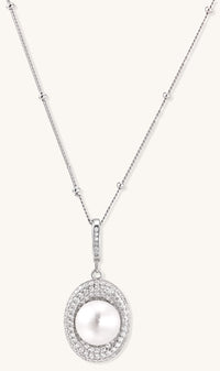 Sterling silver necklace with freshwater pearl in sparkling crystal halo pendant on delicate beaded chain