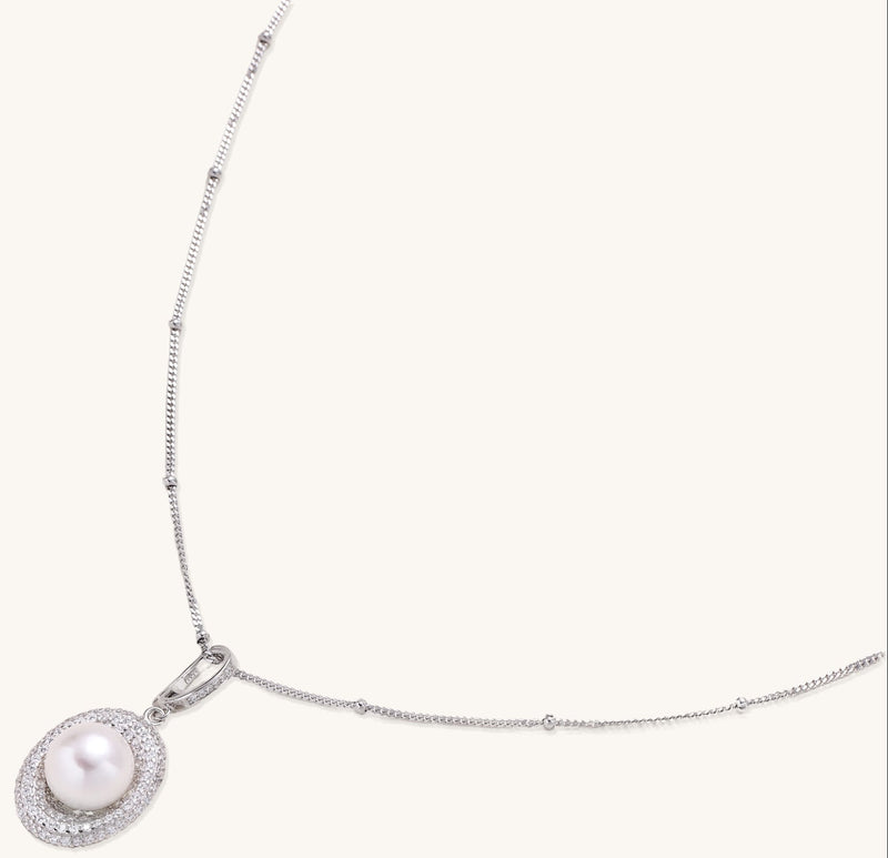 Sterling silver necklace with freshwater pearl in sparkling crystal halo pendant on delicate beaded chain