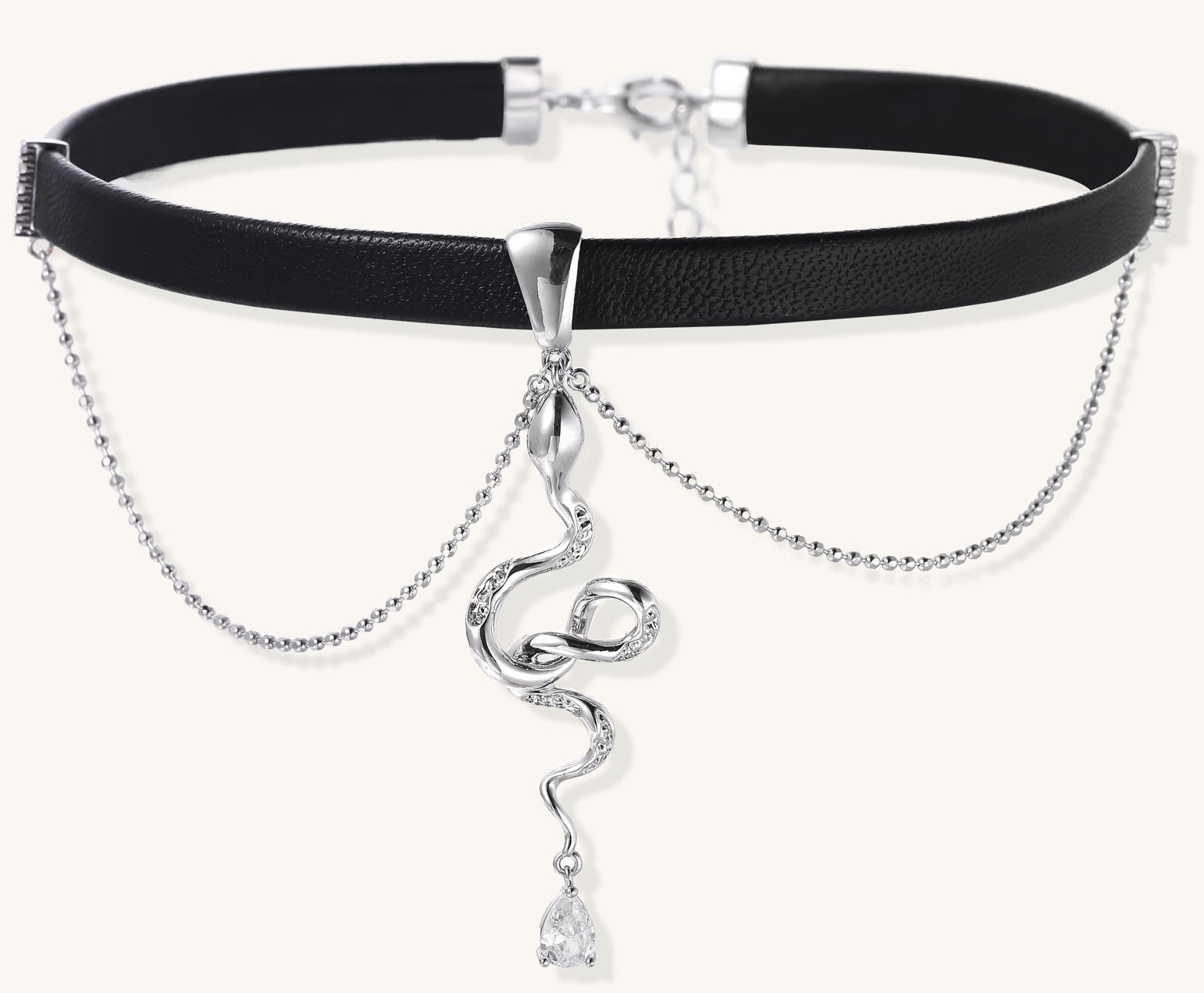 Black leather choker with gold-plated serpent pendant and crystal droplet on white background, adjustable chain design