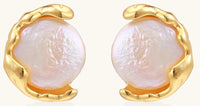 Gold-plated sterling silver stud earrings with organic claw settings cradling lustrous freshwater pearls on white background.