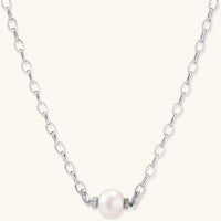 Sterling silver chain necklace with single white freshwater pearl centerpiece on neutral background, 445mm length.