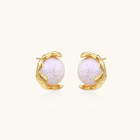 Gold vermeil studs with lustrous pink freshwater pearls in organic crescent settings