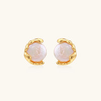Gold vermeil studs with lustrous pink freshwater pearls in organic crescent settings
