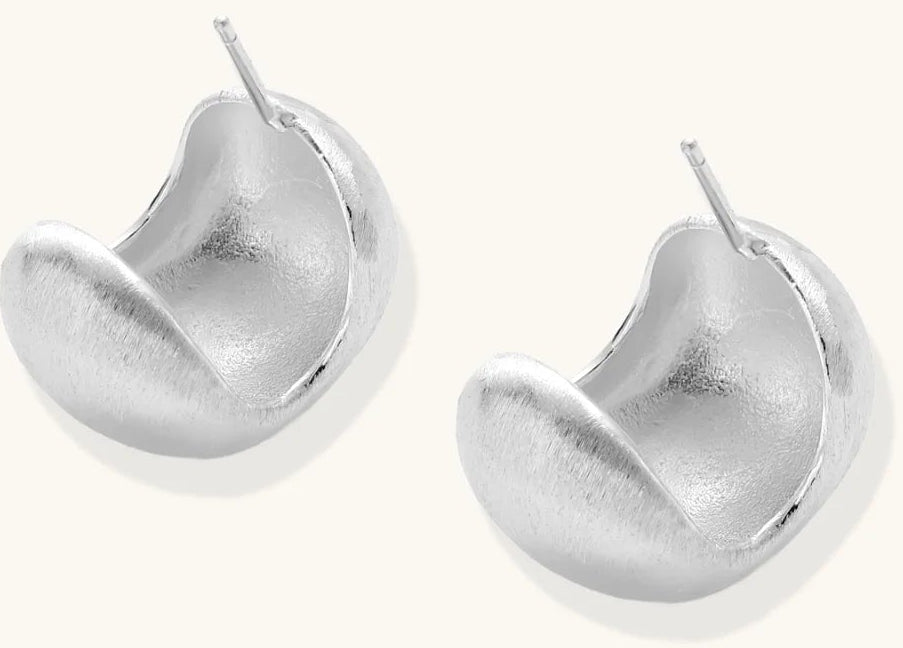 Brushed sterling silver cushion-shaped stud earrings with matte finish on white background