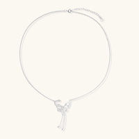 Sterling silver butterfly pendant with textured wing detail on adjustable Y-chain with ball drop ends