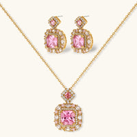 14K gold-plated jewelry set featuring square-cut cubic zirconia stones in ornate layered settings on white background.