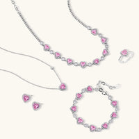 Pink heart-shaped cubic zirconia jewelry set with white gold plating featuring necklace, earrings, bracelet and ring