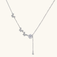 Sterling silver Y-shaped necklace with butterfly charms and brilliant moissanite stone with teardrop pendant