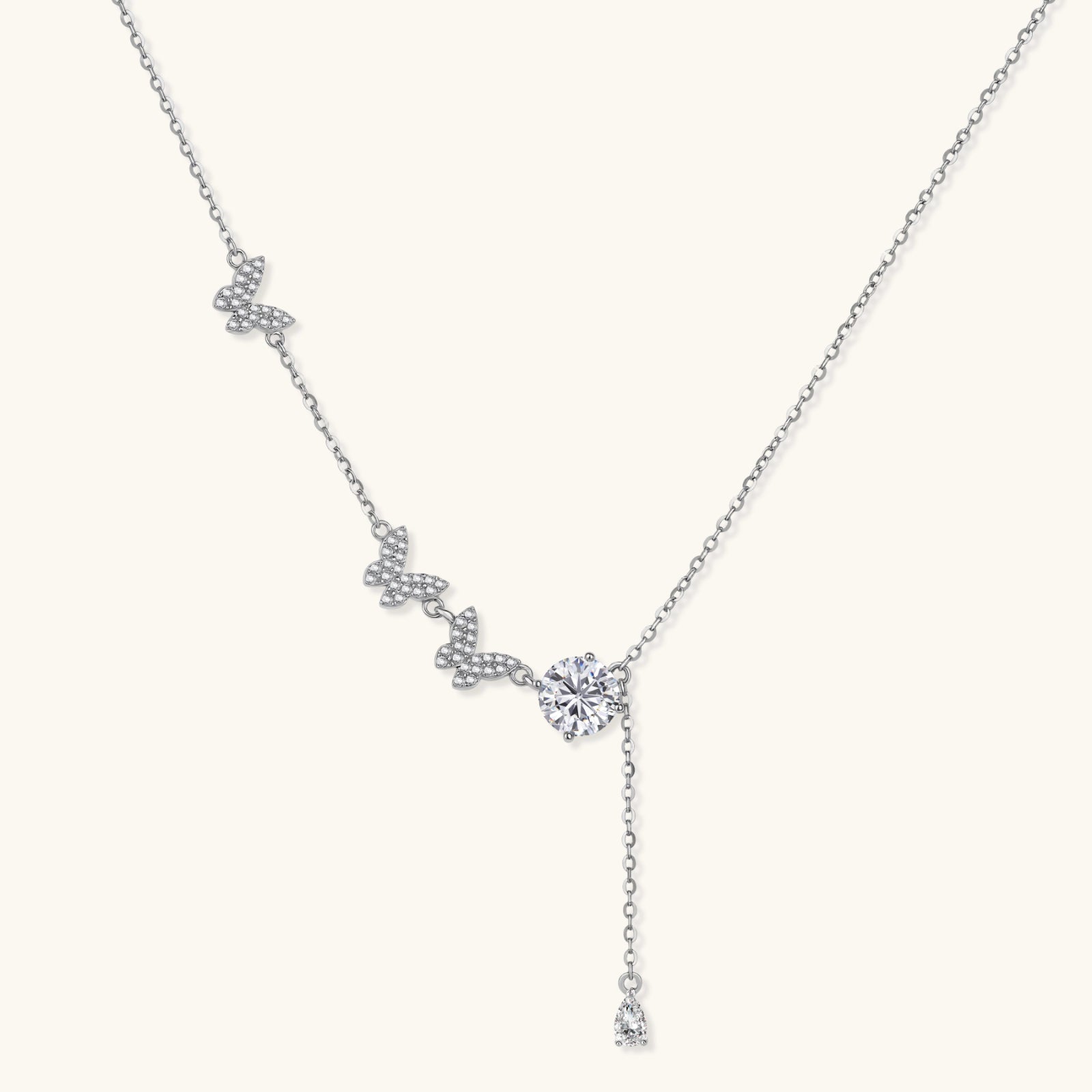 Sterling silver Y-shaped necklace with butterfly charms and brilliant moissanite stone with teardrop pendant