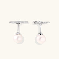 Rhodium-plated sterling silver ear jacket earrings with diamond-set horizontal bar and freshwater pearl drop