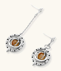 Complete jewelry set featuring citrine stone chips, silver beads, and cosmic circle pendants on cream background.