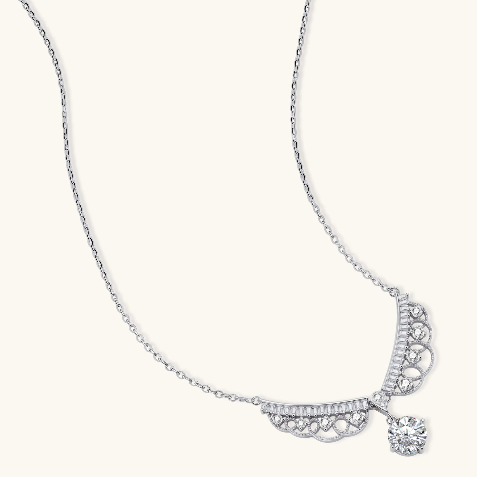 Delicate sterling silver necklace with intricate angel wing pendant featuring brilliant moissanite stones in openwork design