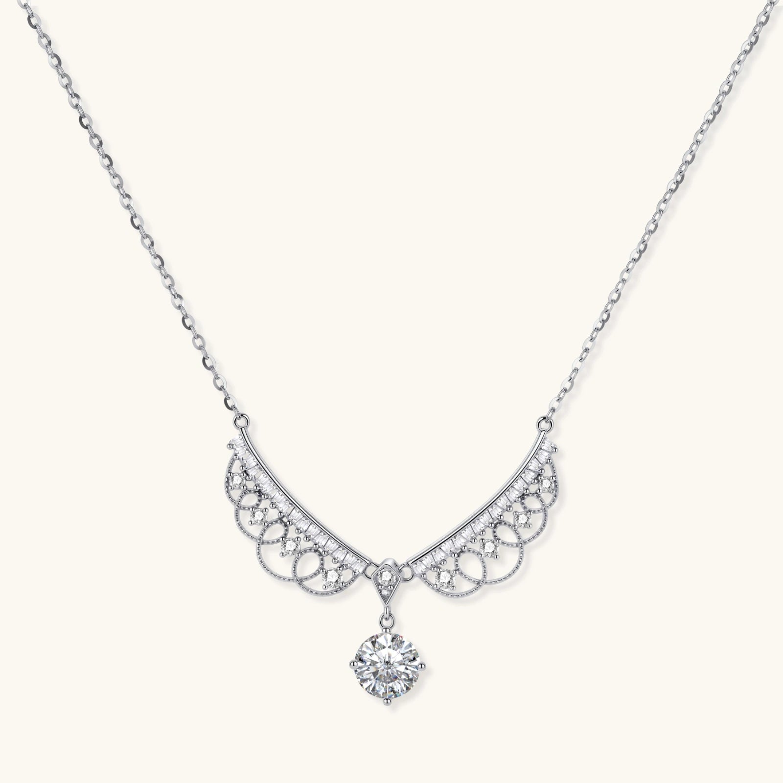 Delicate sterling silver necklace with intricate angel wing pendant featuring brilliant moissanite stones in openwork design
