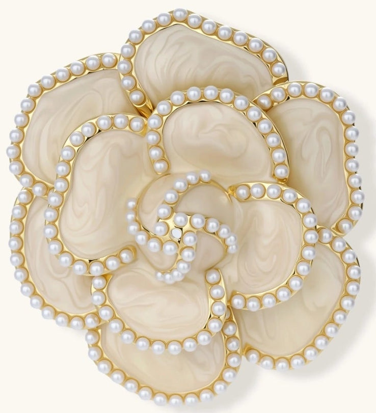 Elegant cream-colored rose brooch with gold plating, zirconia stones, and pearl-like border details on neutral background.