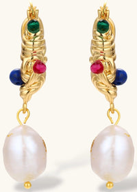 Ornate gold-plated hoop earrings with emerald, ruby, and sapphire accents, featuring dangling baroque freshwater pearls