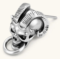 Silver 316L stainless steel stud earring shaped as a horned demon skull with ram horns and a dangling mouth ring.