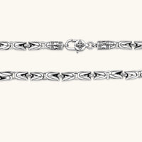Men's antique silver Byzantine chain necklace, 6.2mm wide interlocking S-link pattern with ornate lobster clasp, 560mm length.