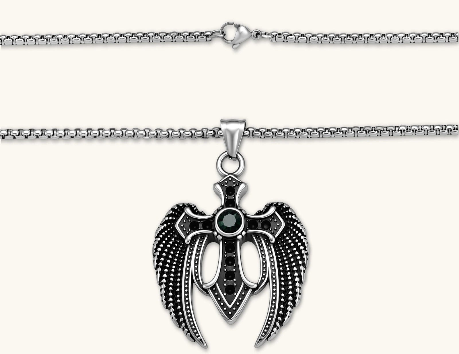 Silver stainless steel angel wing cross pendant necklace with green CZ center stone and black crystals on a box chain.