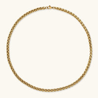 18K gold-plated stainless steel wheat chain necklace, 4.2mm wide, with lobster clasp, on off-white background.