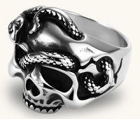Silver stainless steel ring with bold skull face and coiled snake wrapping the crown, blackened recessed details.