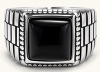 Silver stainless steel signet ring with checkered band texture, beaded border, and square black onyx cabochon stone center.