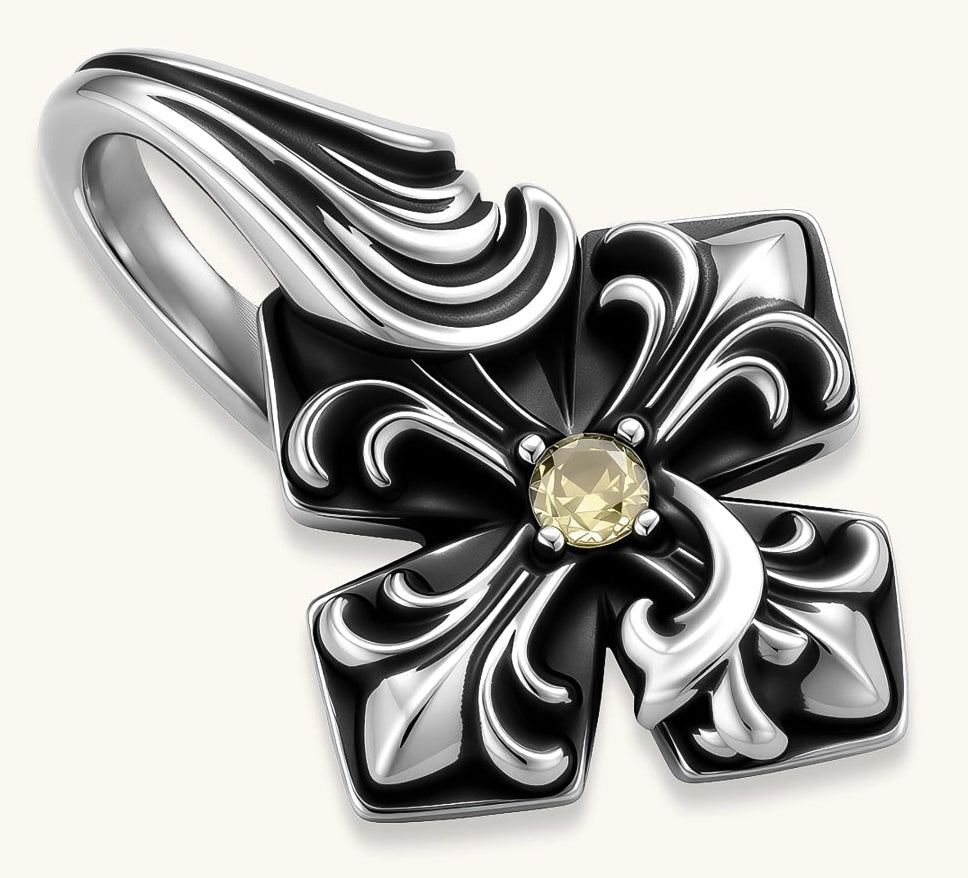 Sterling silver oxidized fleur-de-lis cross pendant with yellow gemstone center on a box chain, 36mm drop.