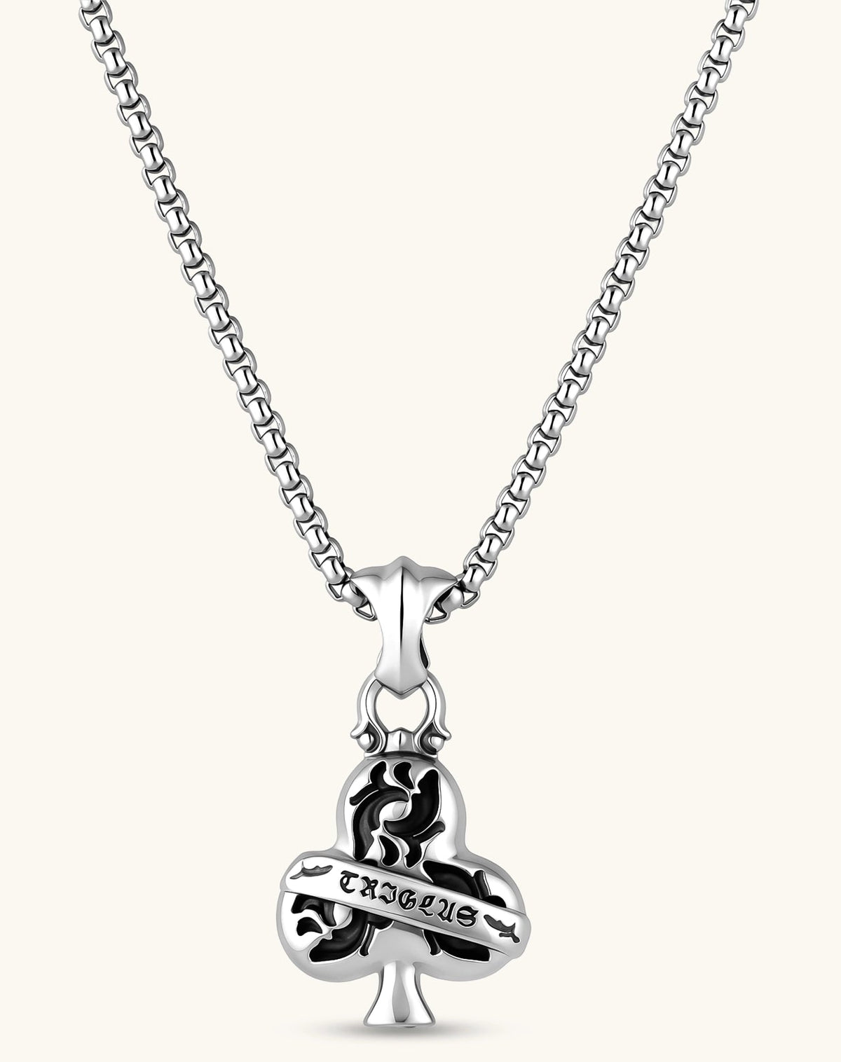 925 sterling silver club-suit pendant with black filigree inlay and TRICLUS banner, 40mm, on a box chain.