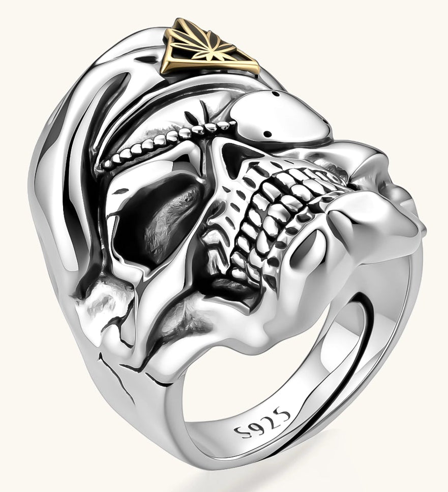 925 sterling silver skull ring wearing a military beret with a gold triangular cannabis leaf badge, blackened eye sockets, 23.9g.